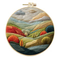 Embroidery DIY kit with landscape-printed cotton fabric, thread, needles, and a 15cm bamboo-style frame.