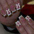 French manicure nail art set with bow, tulip, and starry sky designs on short European square nails