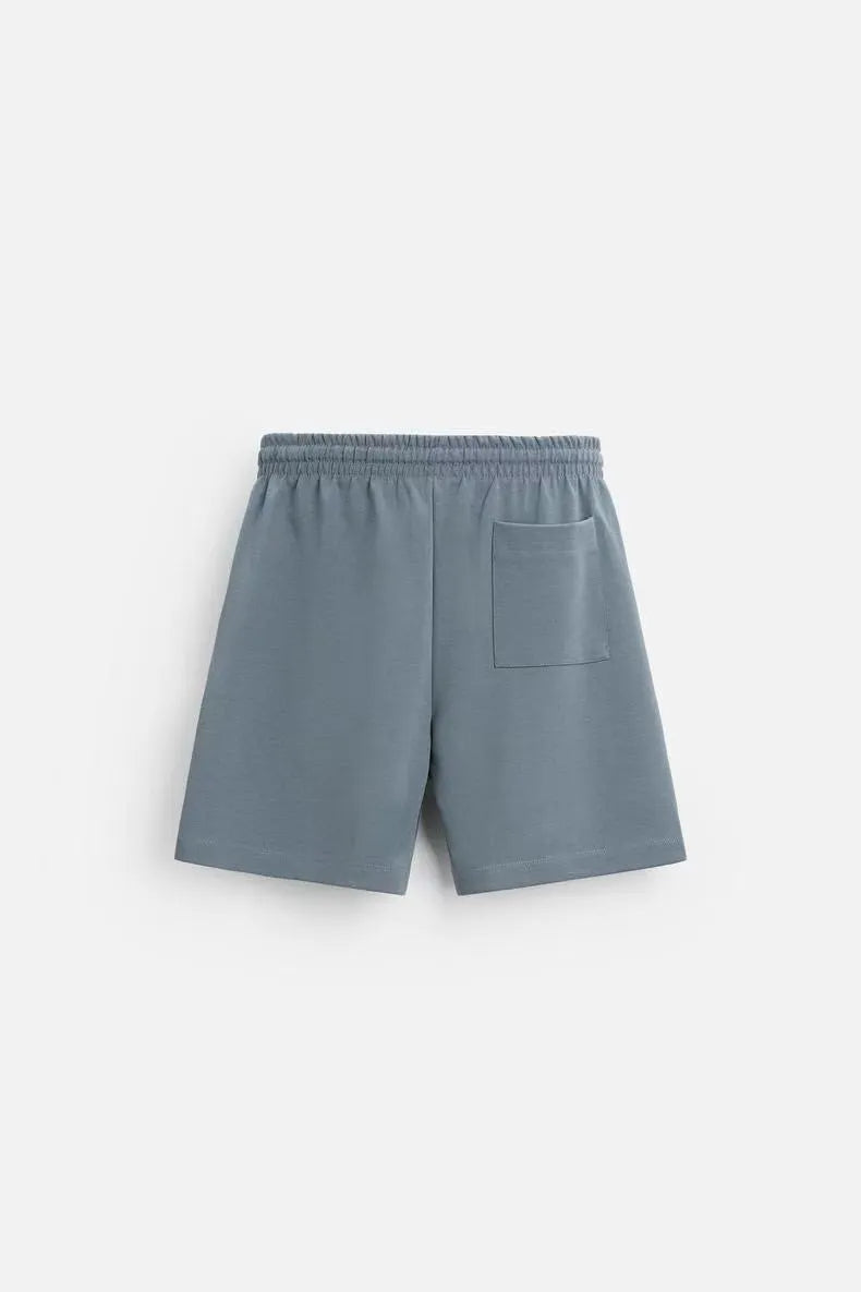 Loose-fitting short sleeve shirt and matching shorts lounge set in blue with double-sided texture