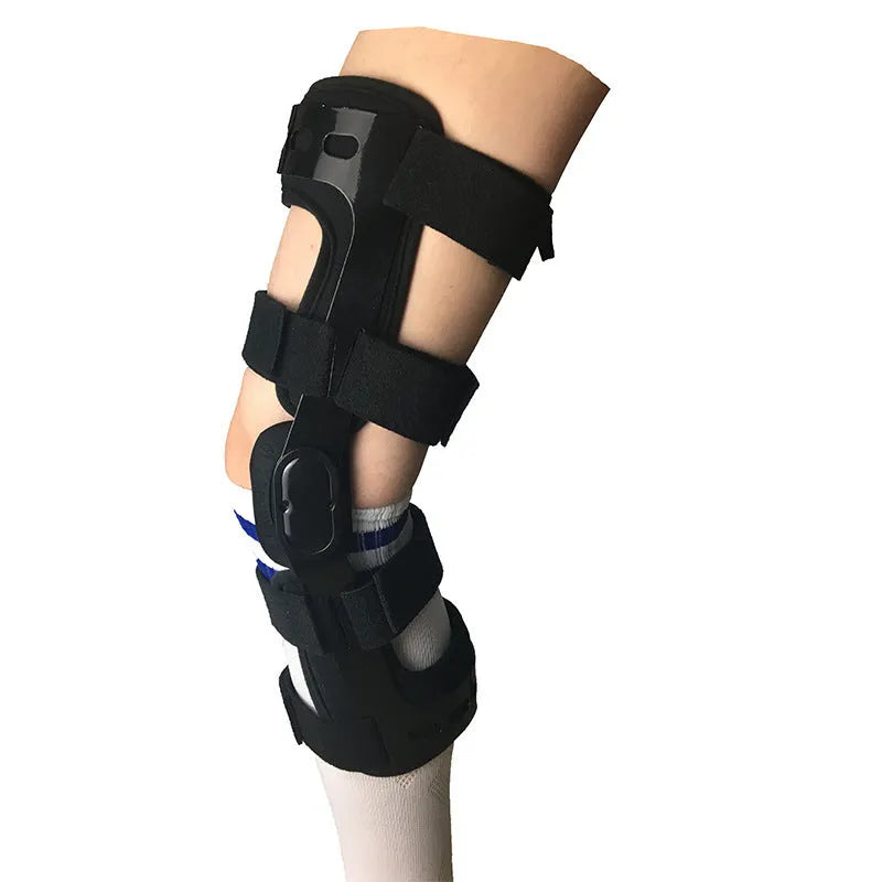 Black anterior ligament knee pad with visible straps and metal splints on a white background.