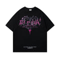 Men's black cotton t-shirt with retro printed design showing loose fit and short sleeves