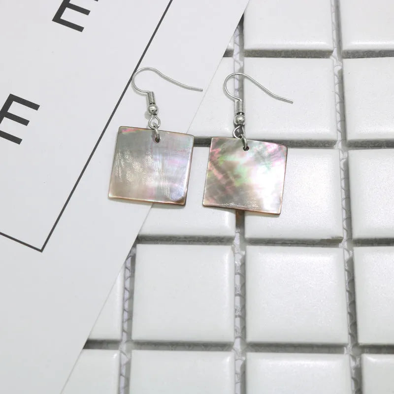 Geometric shell earrings in rectangular and square designs with natural retro style