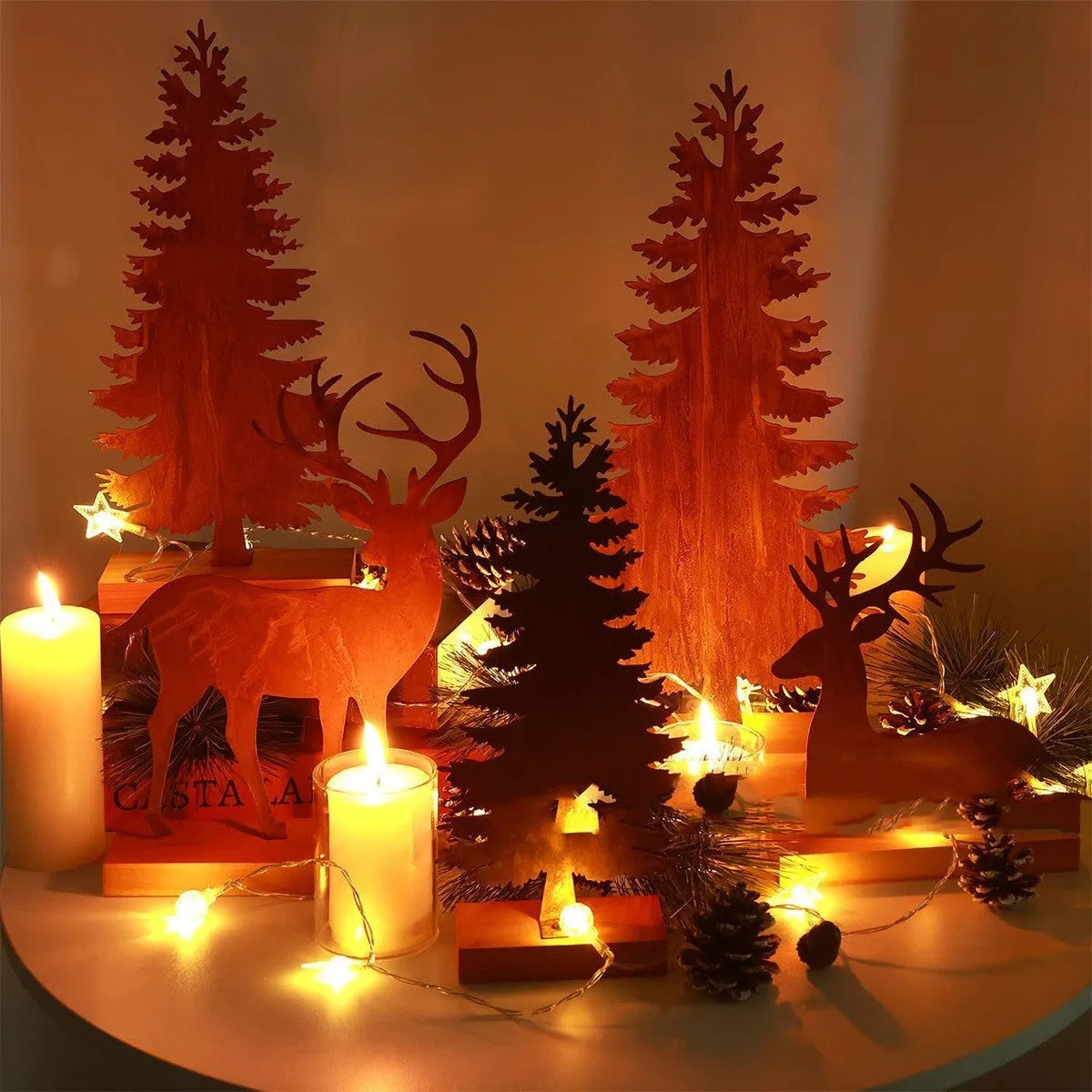 Set of three rusty iron Christmas tree ornaments on a wooden surface