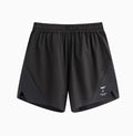Close-up of black four-point stretch running shorts showing laser stitching detail on spandex fabric.
