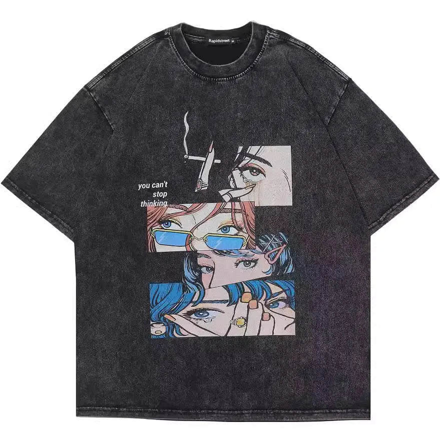Man wearing a loose black cotton t-shirt with a retro cartoon print on the front.