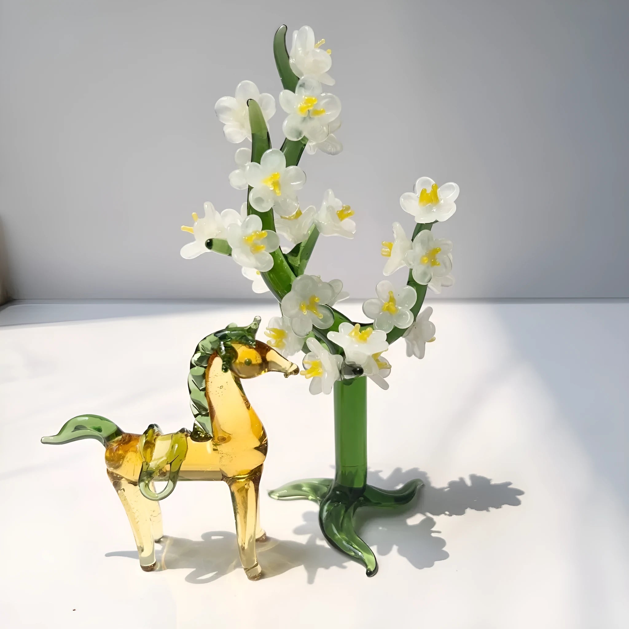 Glazed ceramic horse figurine decoration in modern simplicity style on a desk.