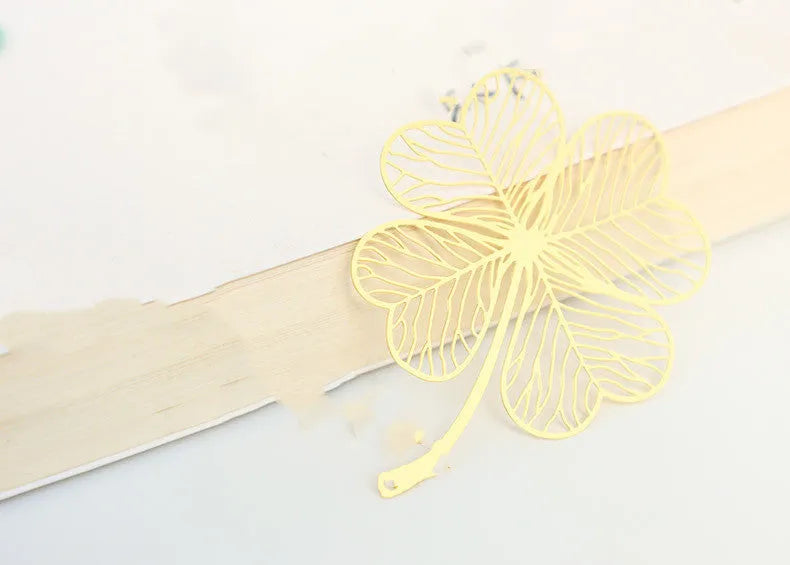 Brass metal bookmark with hollow plating decorative leaf pattern and rose gold tassel