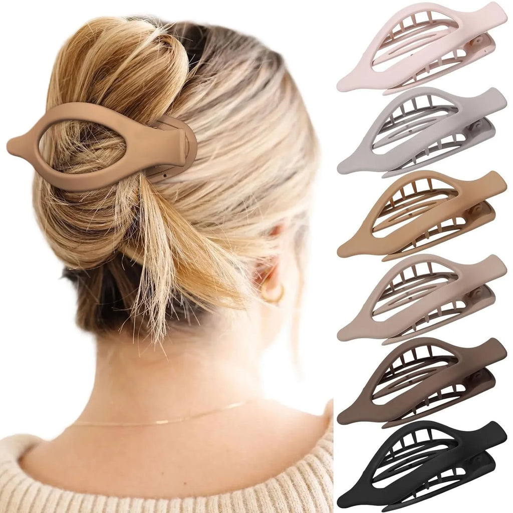 Six nude and rose red plastic hair clips with quadrilateral frosted grip design on white background