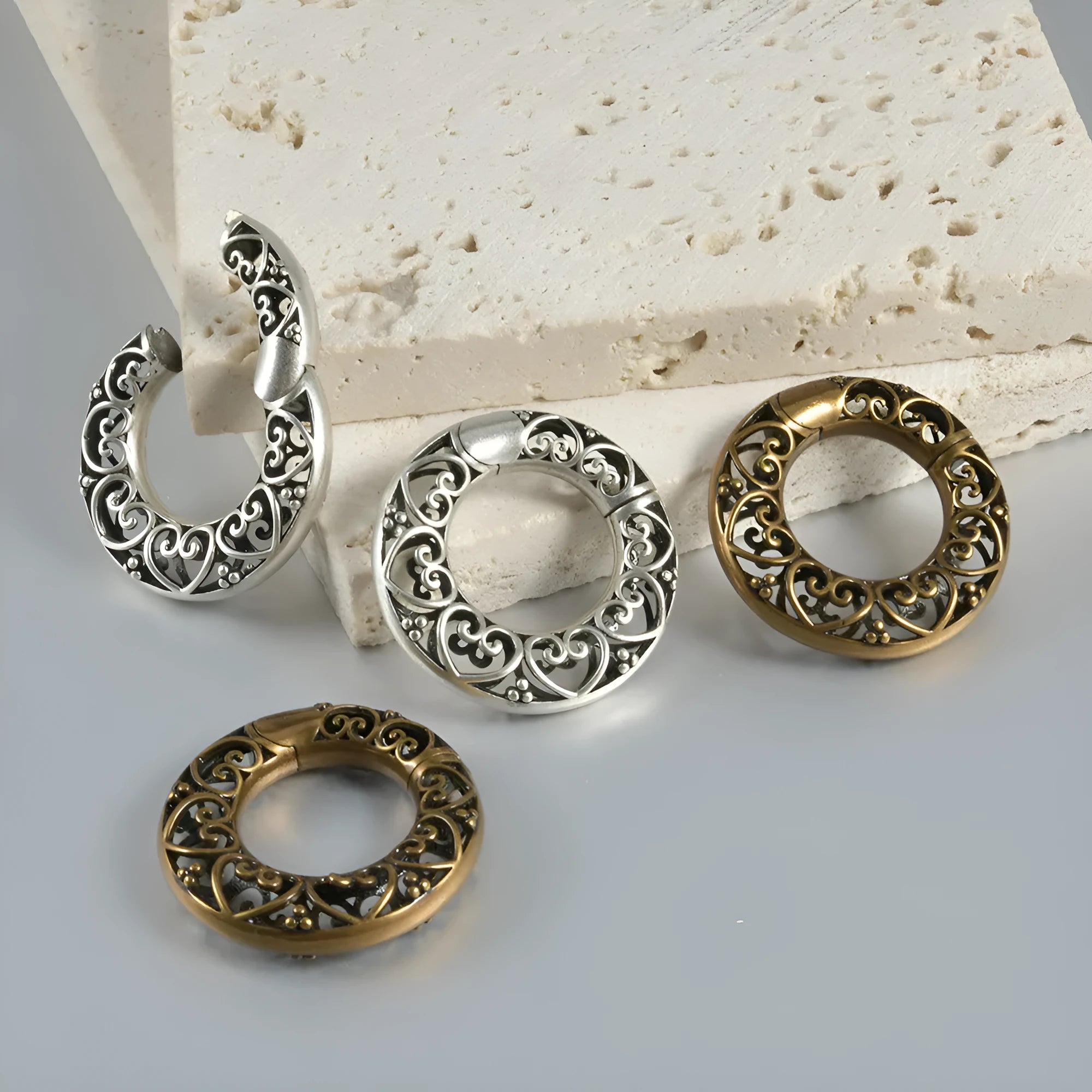 Retro heart-shaped and lotus magnetic earrings in stainless steel with antique finishes