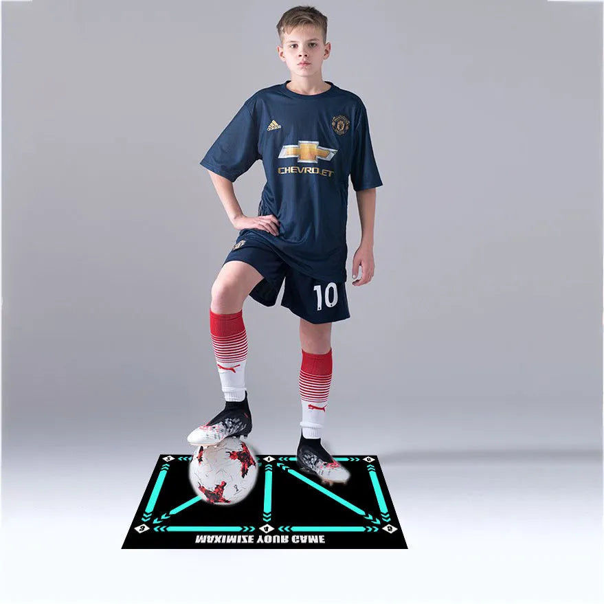 Black football training mat measuring 60 by 90 centimetres with non-slip base