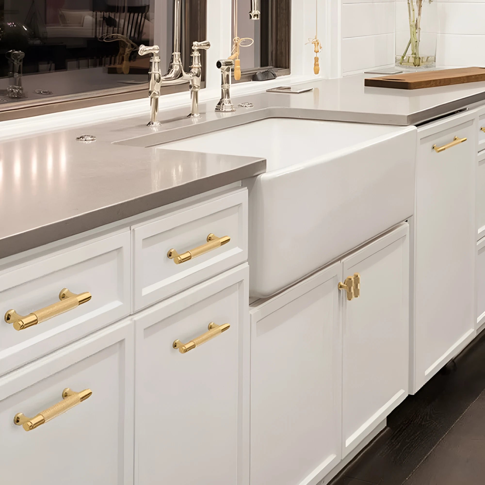 Brushed brass aluminium alloy cabinet handle with visible screw holes for mounting.