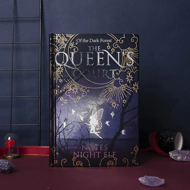 Blue and purple A5 luminous hardcover notebooks with Night Elves design, open to show full-colour illustrated pages.
