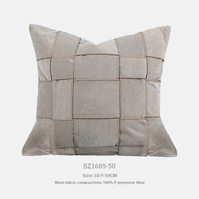 50cm square chenille woven pillow cushion in a choice of seven colours on a sofa.