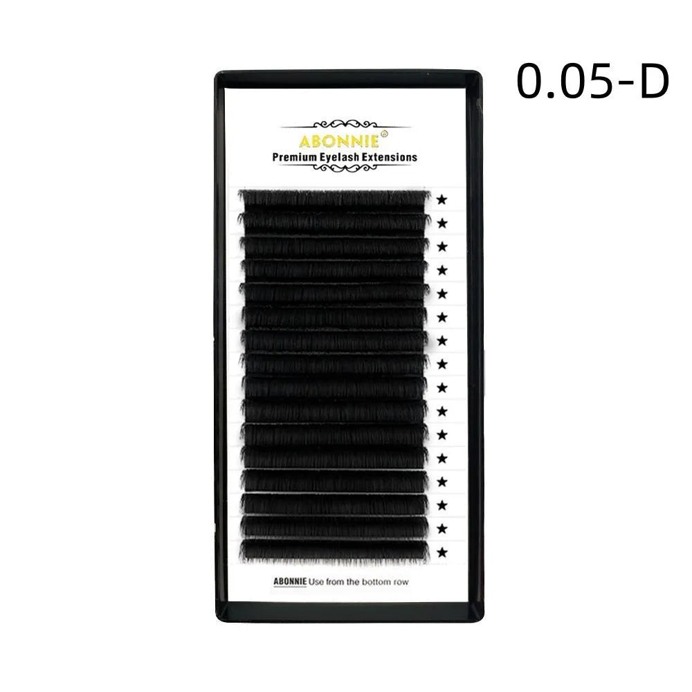 Dense 16-row false eyelashes made from mink hair in a matte round wool style on a clear strip.