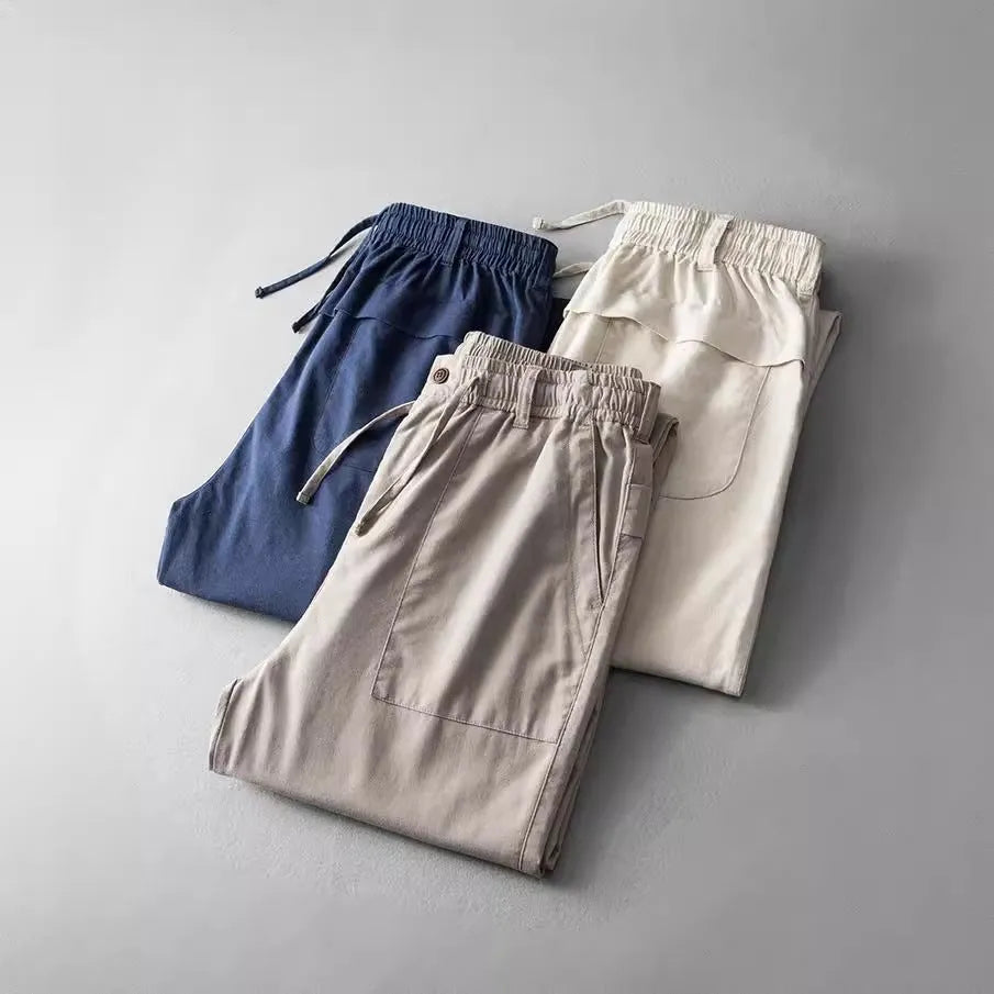 Men's straight-leg linen trousers in a retro casual style, shown in a solid colour.