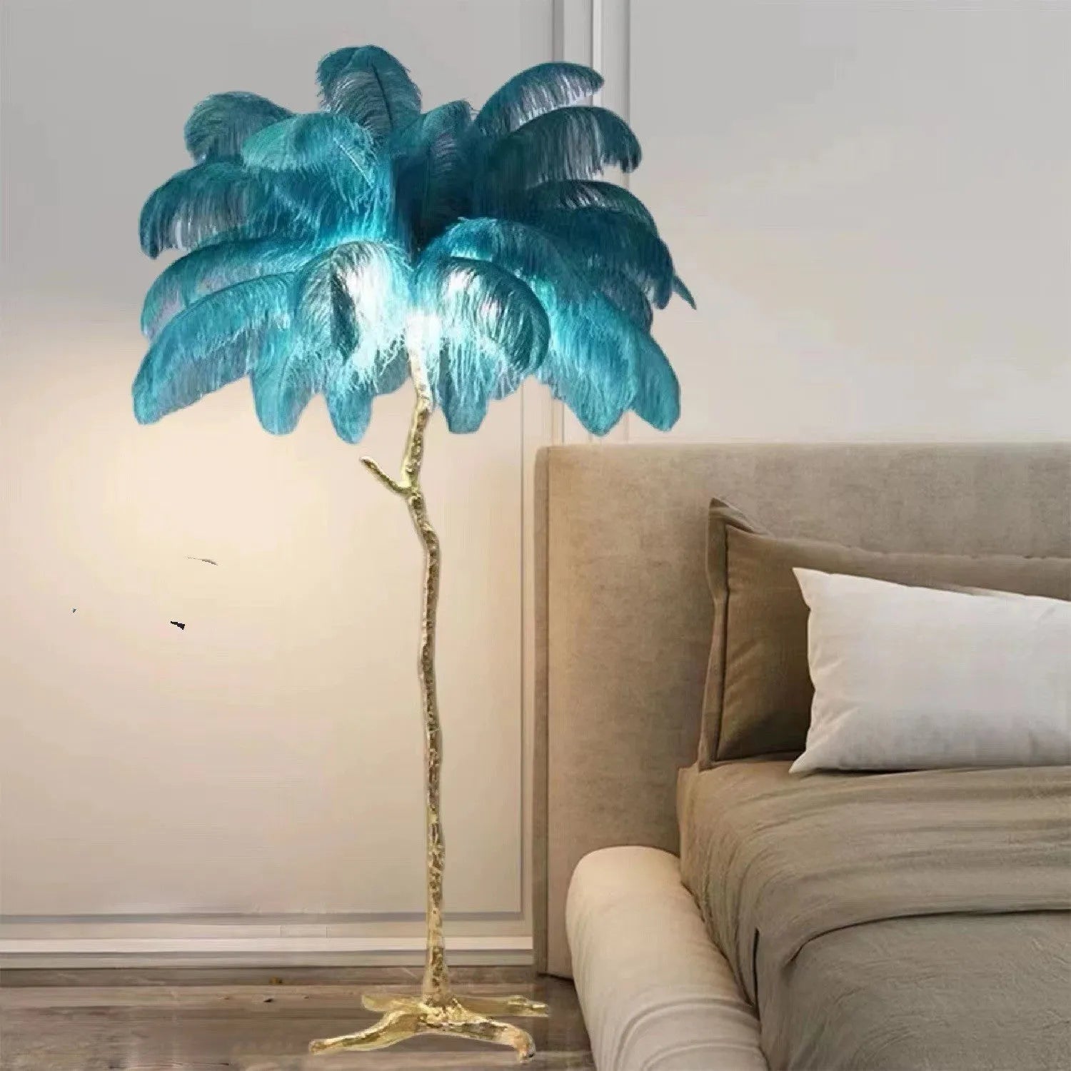 Tall decorative resin floor lamp with feather details in choice of dark green, pink, or white colours
