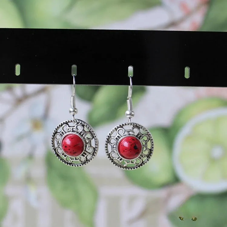 Miao silver ethnic earrings with turquoise geometric flower disk and auspicious patterns