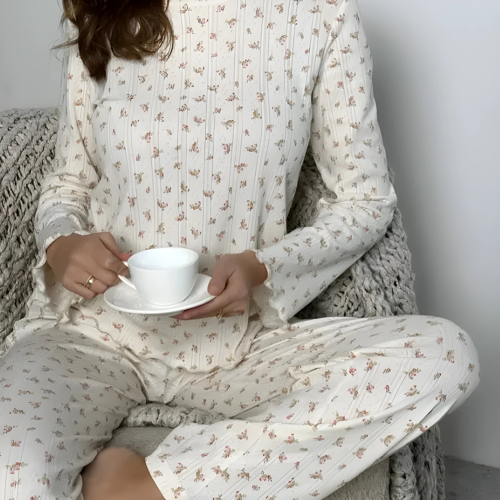 White floral print women's pyjama suit with bell sleeve top and wide-leg trousers