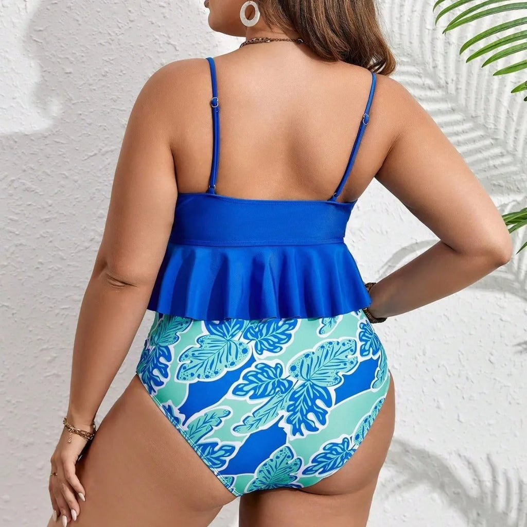 Blue polyester fibre bikini set with top and briefs style shorts in European/American sizes 0XL to 4XL