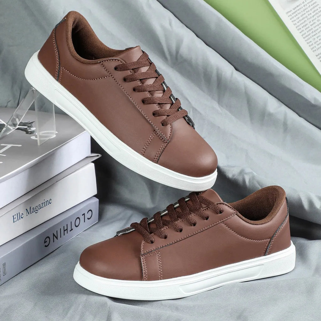 Casual beige brown platform skateboard sneaker with cross strap detail and round toe