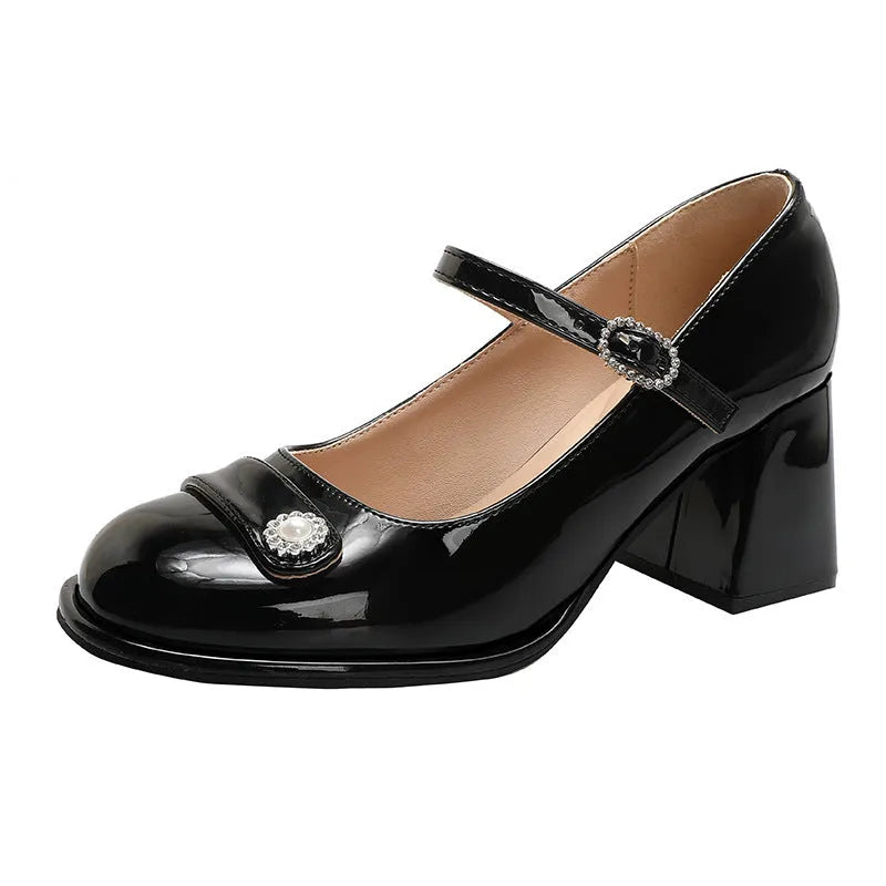 Women's black patent leather chunky heel round toe shoes for wide feet.