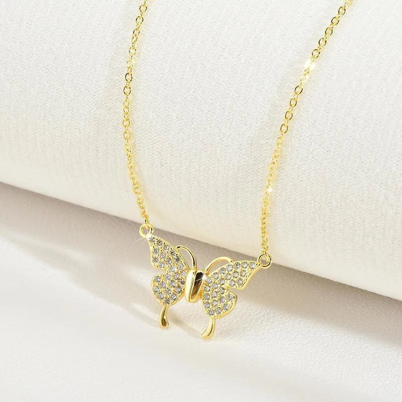 Gold titanium steel clavicle chain necklace with magnetic butterfly charm and twisted chain