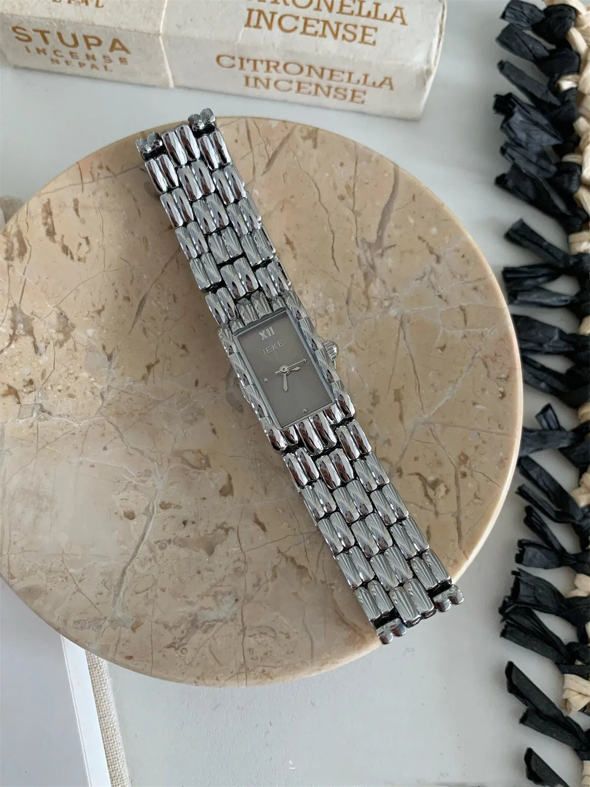 Women's mid-century inspired bracelet watch with 15mm dial and butterfly clasp buckle
