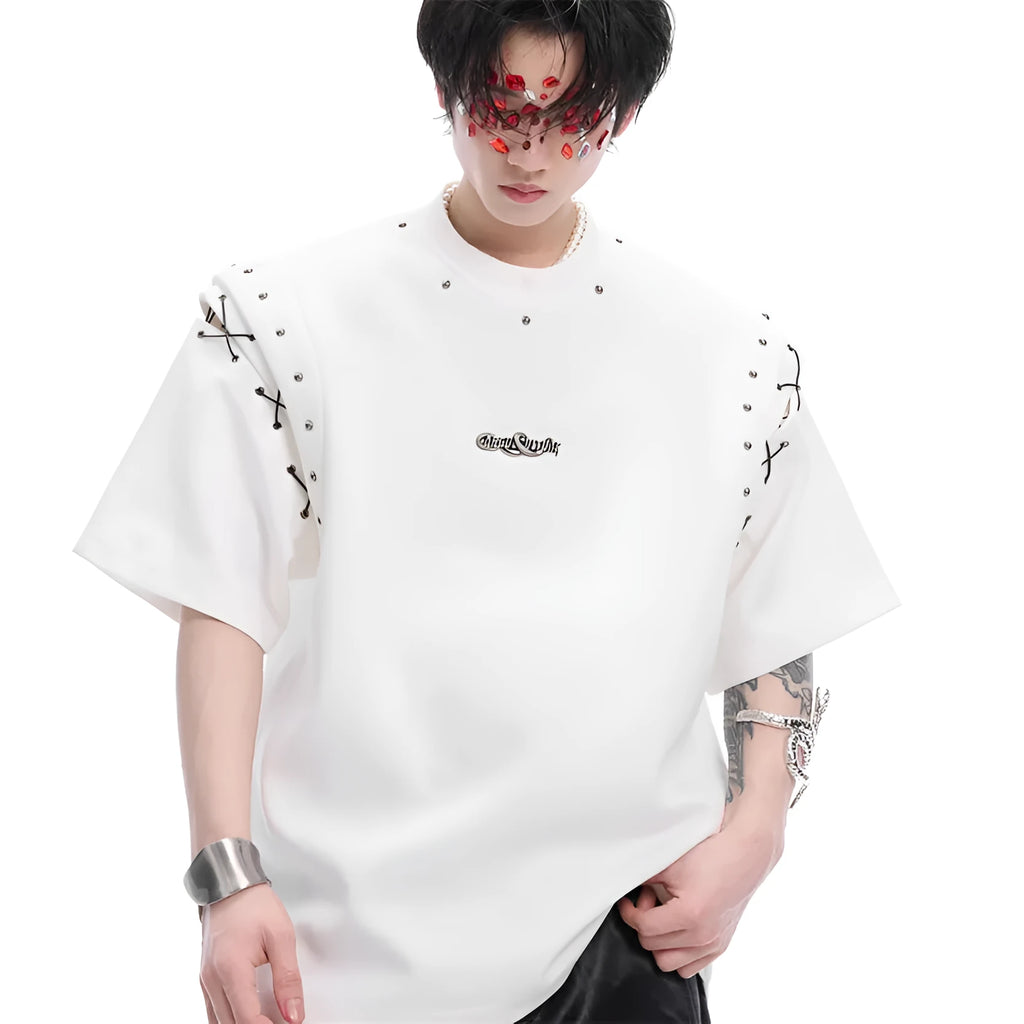 Women's black deconstruction short sleeve t-shirt with a white lace-up detail and front cutout.