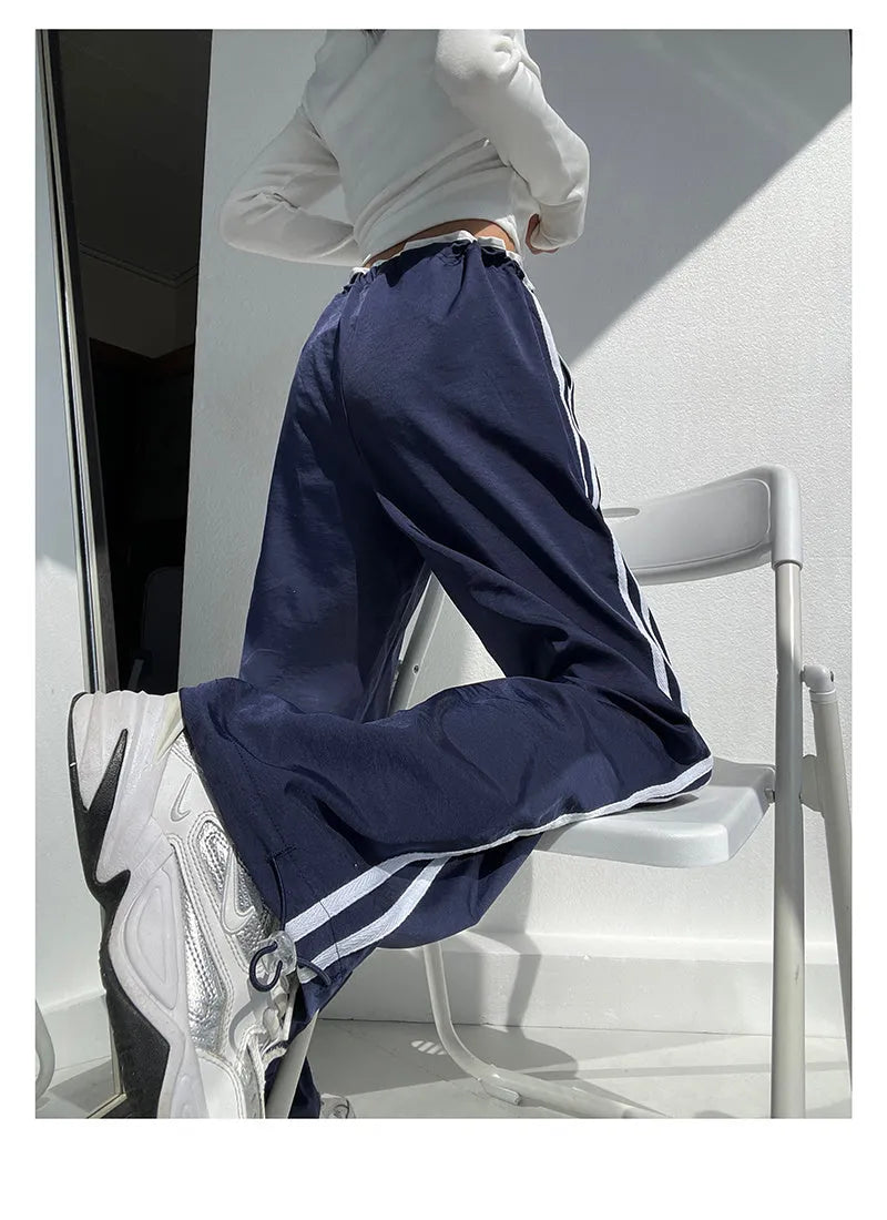Women's loose straight trousers with contrast ribbon parallel bars detailing in white and navy blue options