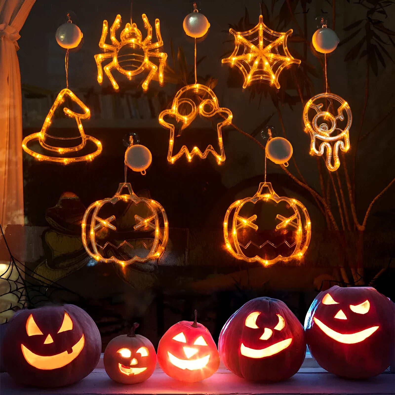 Seven Halloween themed battery-operated LED hanging lights with spider, pumpkin and ghost designs