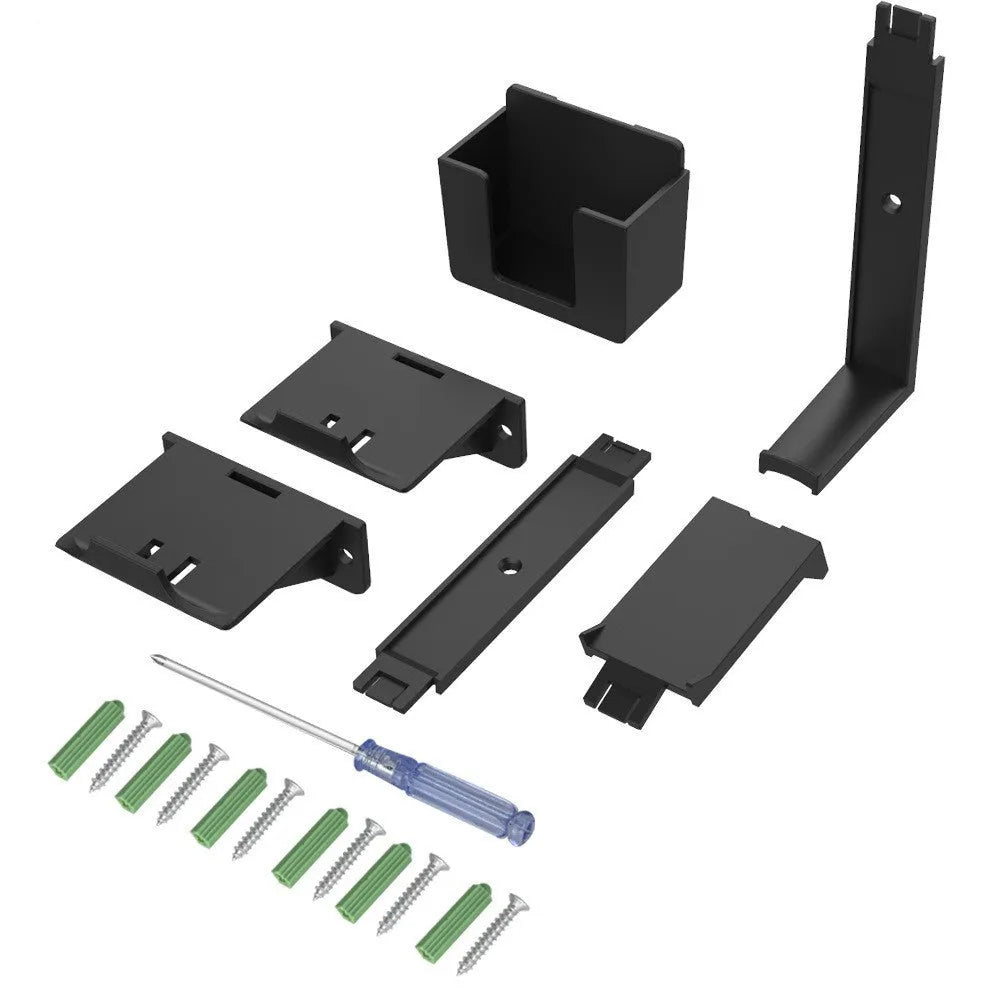 White wall-mounted plastic hook holding a game controller and remote control