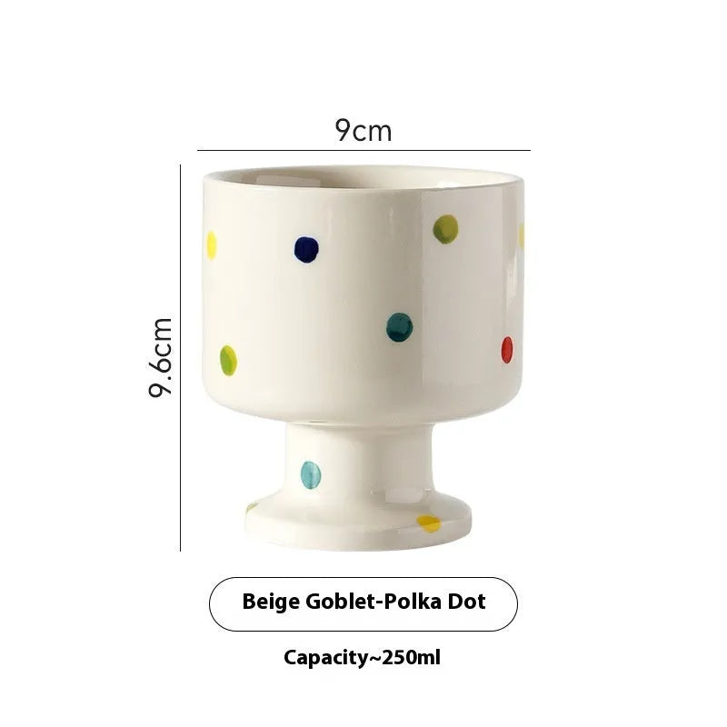 Hand-pinched irregular shaped ceramic mug in a solid colour, modern simple design