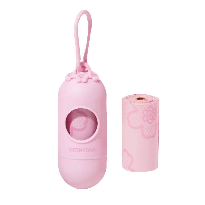 Portable dog poo bag dispenser capsule with scented inner roll in strawberry, orange or cherry blossom options