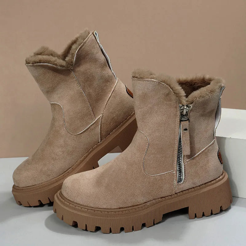 Women's black high-top snow boots with side zipper and round toe, made from cow suede.
