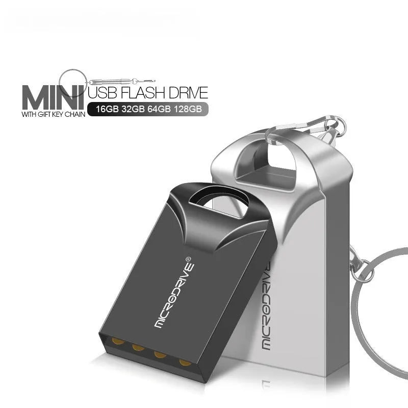 Small black and silver metal USB flash drive showing compact size next to a ruler for scale.