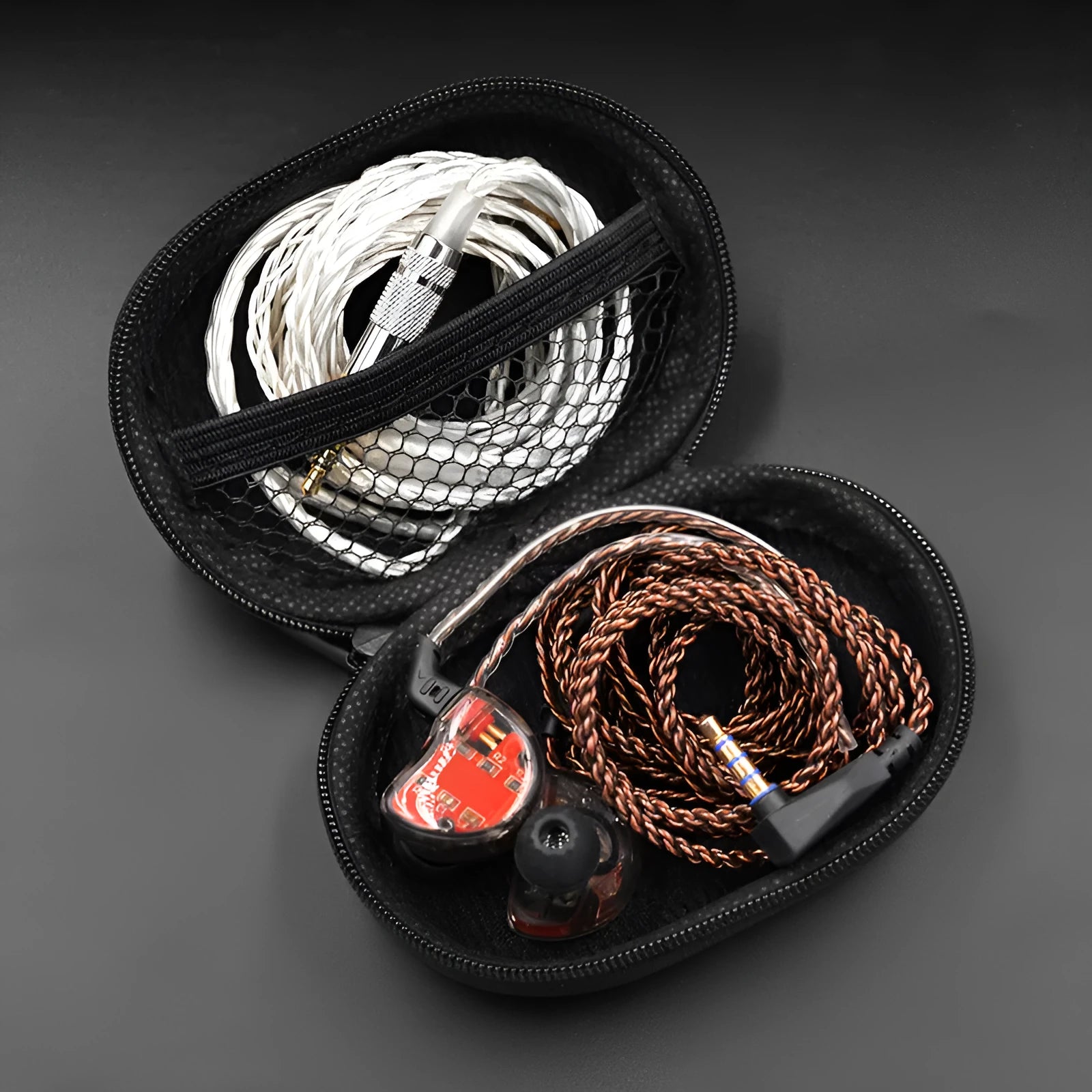 Black oval leather earphone storage bag for EDX PRO and ZEX PRO audio equipment