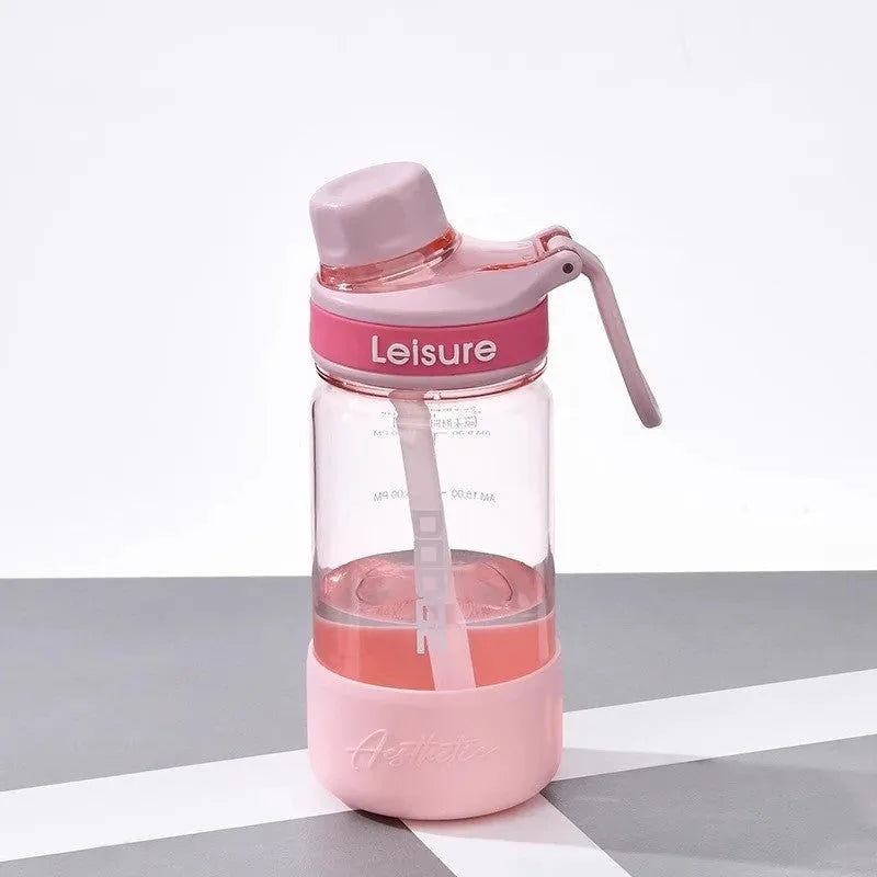 Cartoon pattern heat-resistant plastic straw cup in grey, green, or pink, showing 520ml, 780ml, and 1000ml size options.