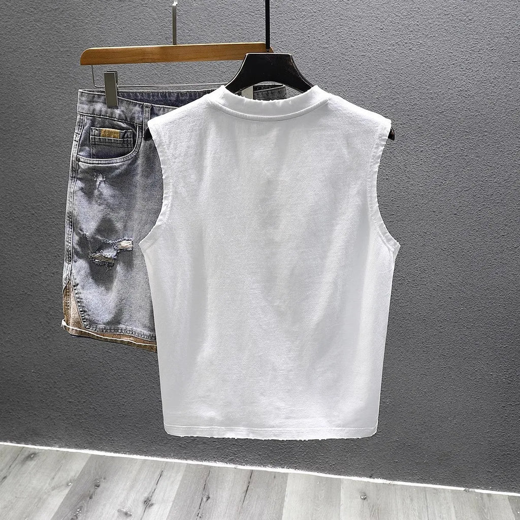 A man's solid black loose-fit cotton sleeveless T-shirt with a straight hem, laid flat.