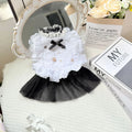 White polyester waltz gauze skirt dog clothing shown on a model, with size chart for XS to XL.