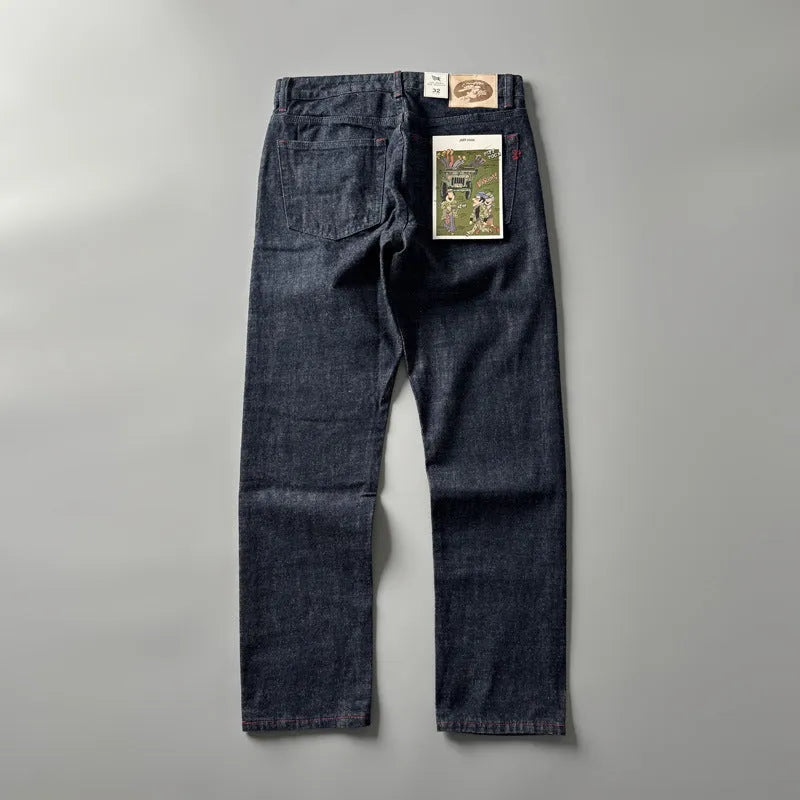 Men's primary colour straight leg jeans in American retro style laid flat, showing the mid waist and full-length leg.