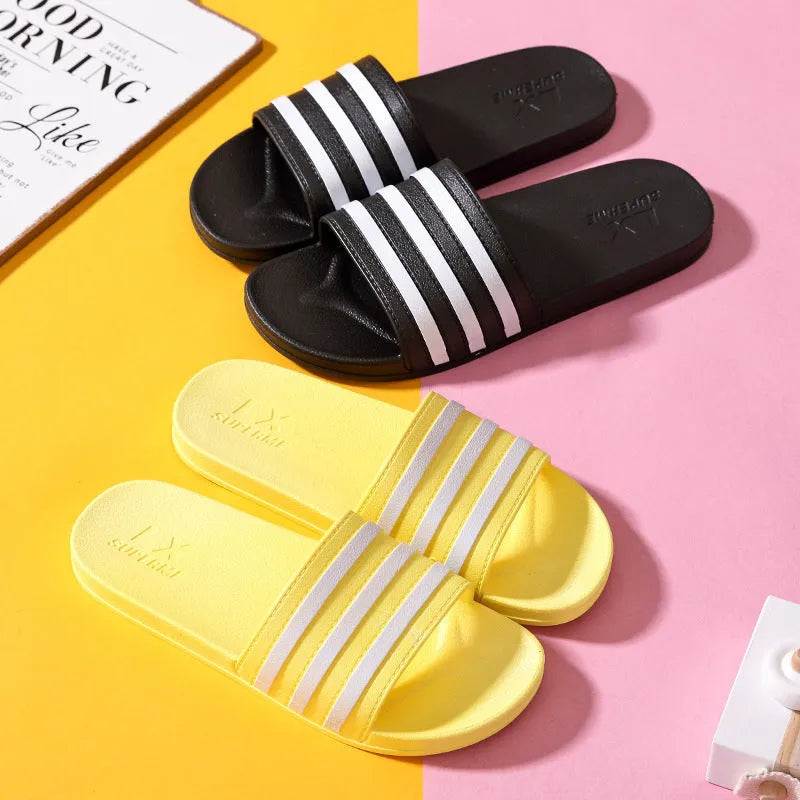 White stripes PVC bathroom slippers for women and men with three-bar design and injection moulded sole