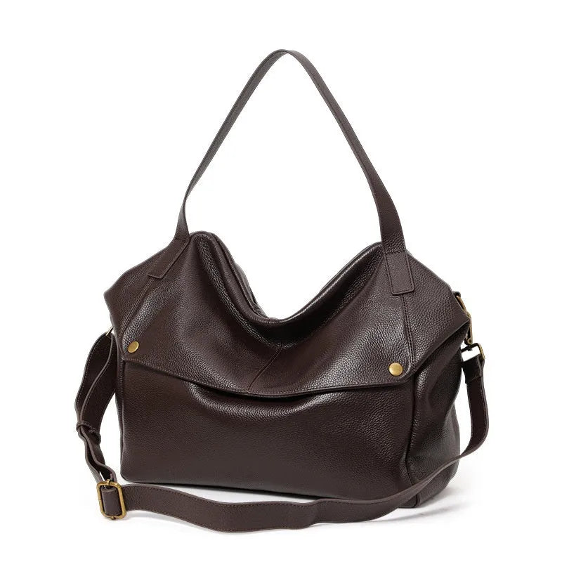 Brown genuine leather women's shoulder bag with a square shape and shoulder strap.