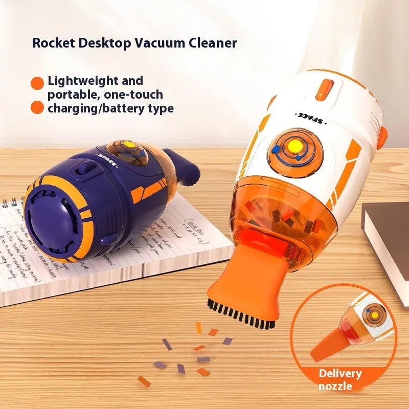 USB-powered handheld desktop vacuum cleaner in blue rocket design on a wooden desk.