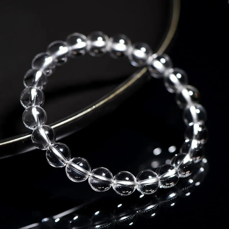 Natural Donghai old materials crystal bracelet with white water round beads in a geometric unisex design.