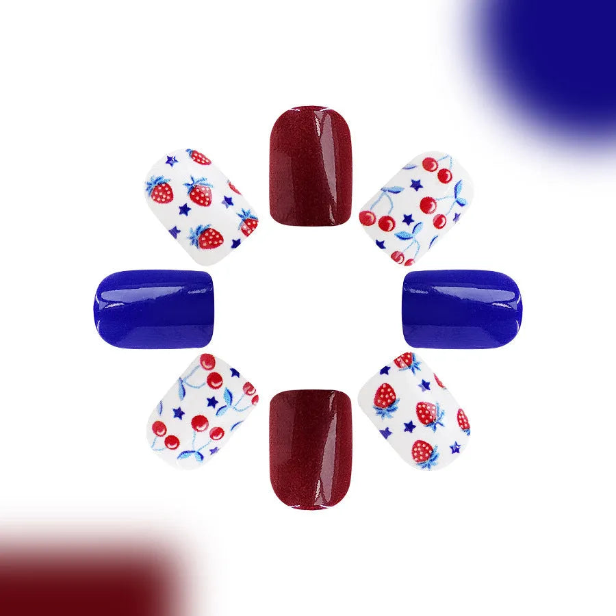 24 short glossy nail stickers with red and blue strawberry and cherry pattern