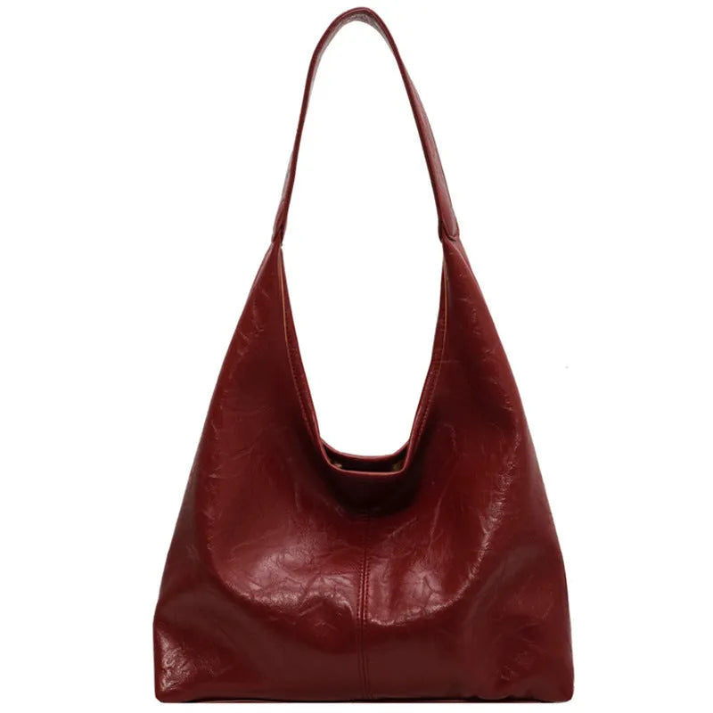 Soft PU leather shoulder bag with multiple external sandwich pockets in street-style design