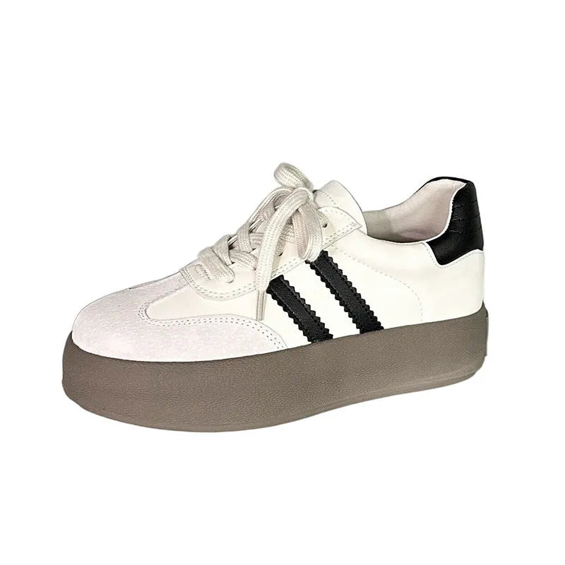 Women's beige distressed leather casual sneakers with round toe and lace-up design on rubber sole