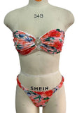 Women's floral print lace detail tube top bikini with matching shorts in blue, yellow, pink, or multi-colour.