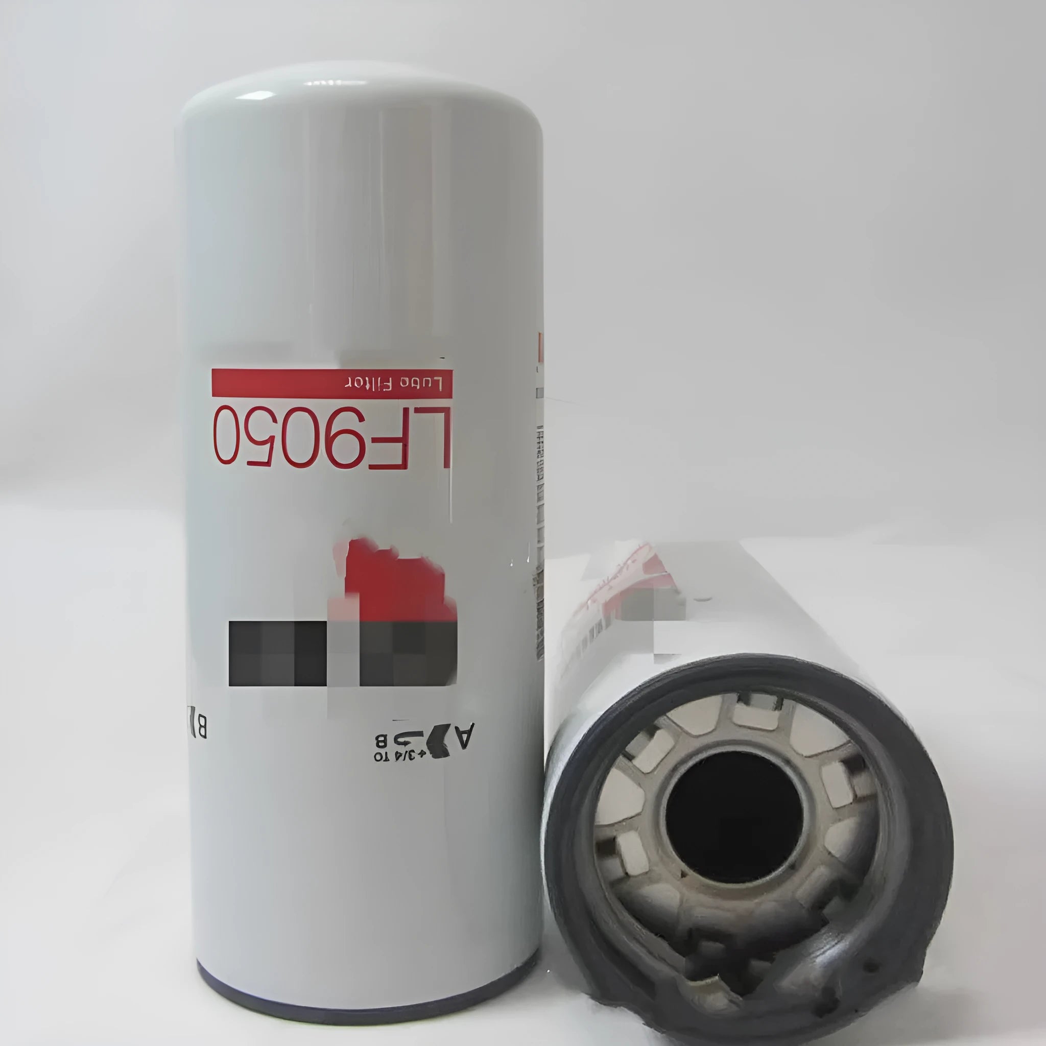 FF5776 white metal folding diesel filter element with 2mm ports for automotive oil systems.