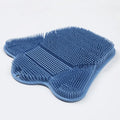 Blue silicone bath massage mat with long handle for back scrubbing.